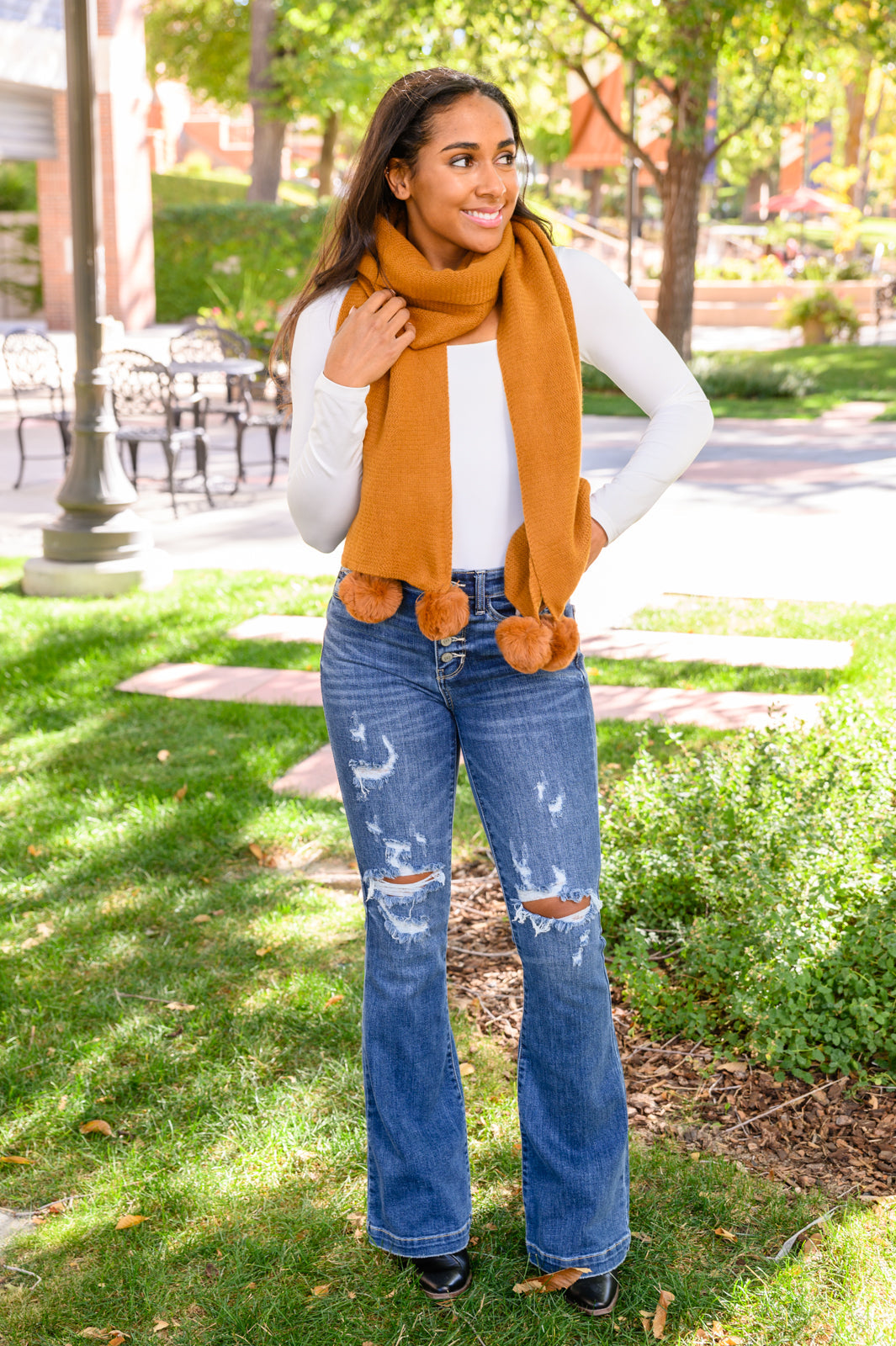 Knitted Fuzzy Pom Pom Scarf In Ginger